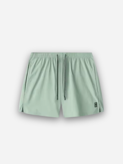 Woven quarter shorts in Light Green with drawcord waistband and side splits